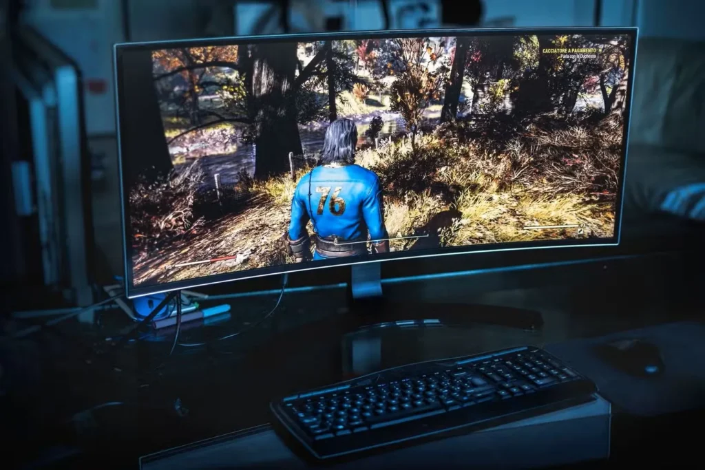 یک مانیتور فوق عریض با Fallout 76 بر روی صفحه نمایش